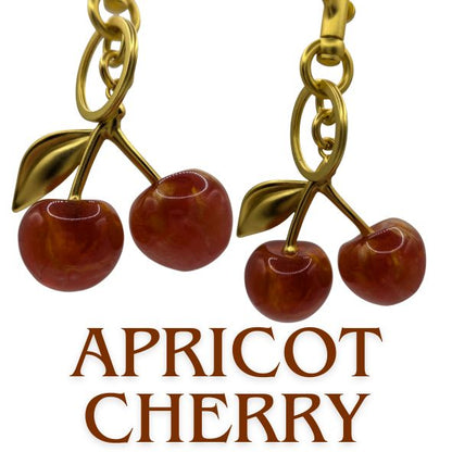 apricot with gold cherry bag charm