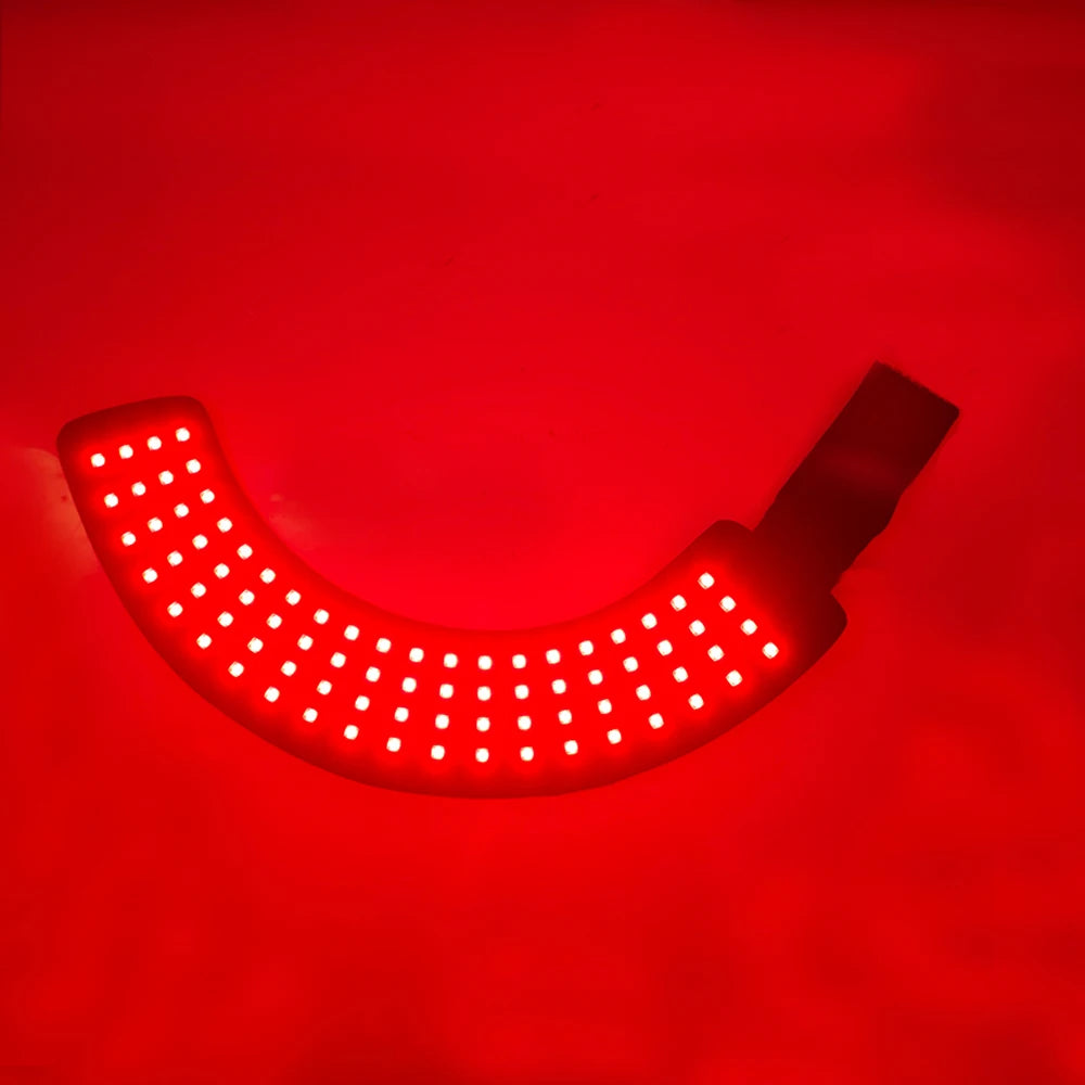 Red LED light strip on a red background